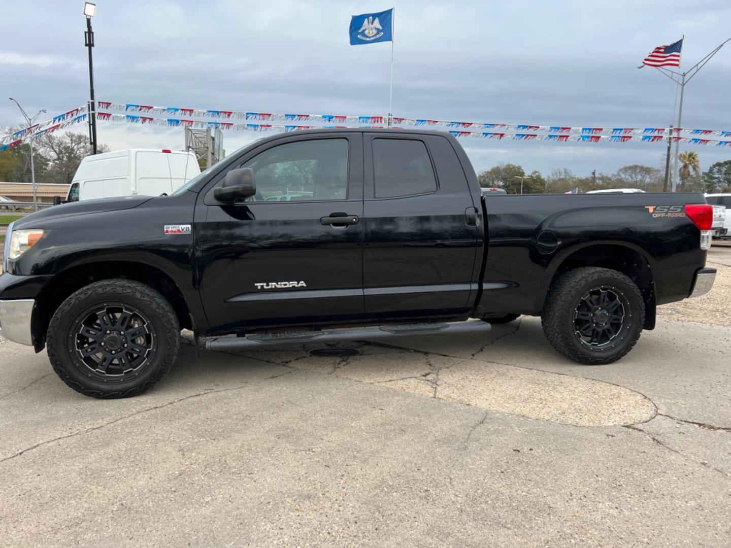 2013 Black /Tan Toyota Tundra TSS (5TFUW5F17DX) with an 5.7 V8 engine, Automatic transmission, located at 4520 Airline Hwy, Baton Rouge, LA, 70805, (225) 357-1497, 30.509325, -91.145432 - 2013 Toyota Tundra Double Cab 4X4 ****One Owner & No Accidents**** 5.7 V8 Gas, 199K Miles, Power Windows, Locks & Mirrors, Spray In Bedliner, Tow Pkg. NO IN HOUSE FINANCING. FOR INFO PLEASE CONTACT JEFF AT 225 357-1497 CHECK OUT OUR A+ RATING WITH THE BETTER BUSINESS BUREAU WE HAVE BEEN A FAMILY OWN - Photo#1